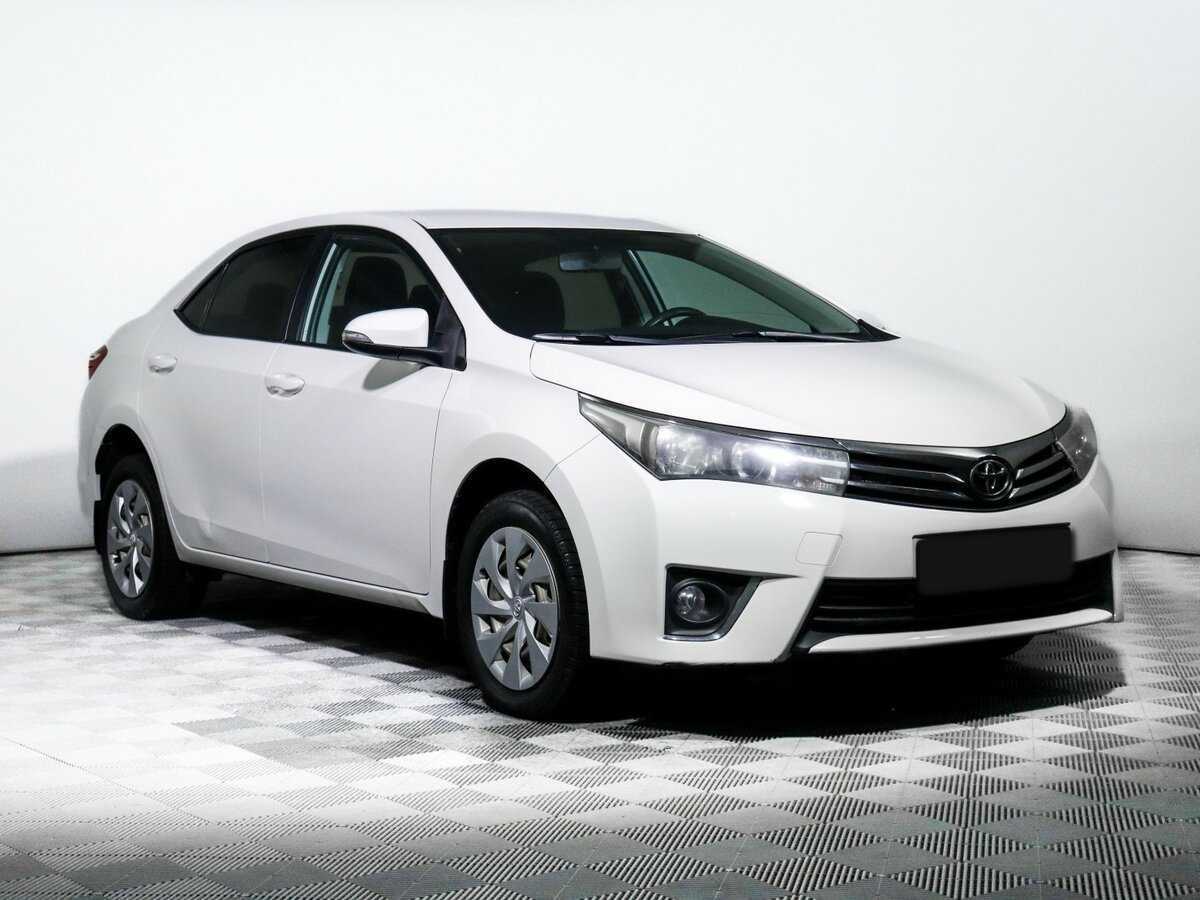 Toyota Corolla б/у, 2014, Механическая. Фото: #2